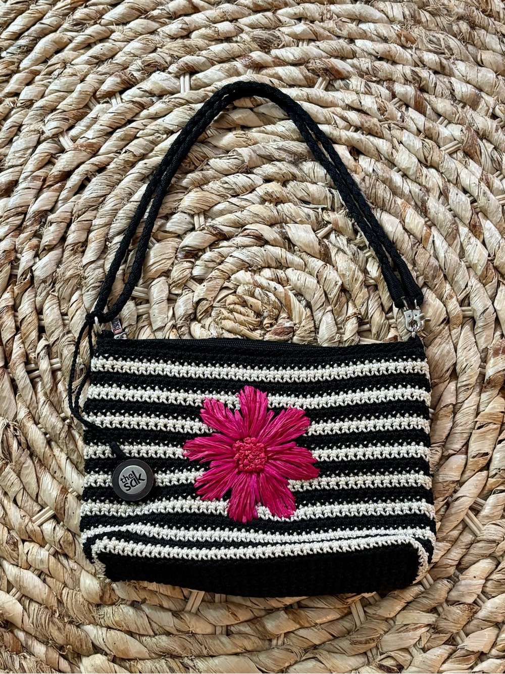 The Sak Black & White Striped Crochet Shoulder Bag with Hot Pink Flower